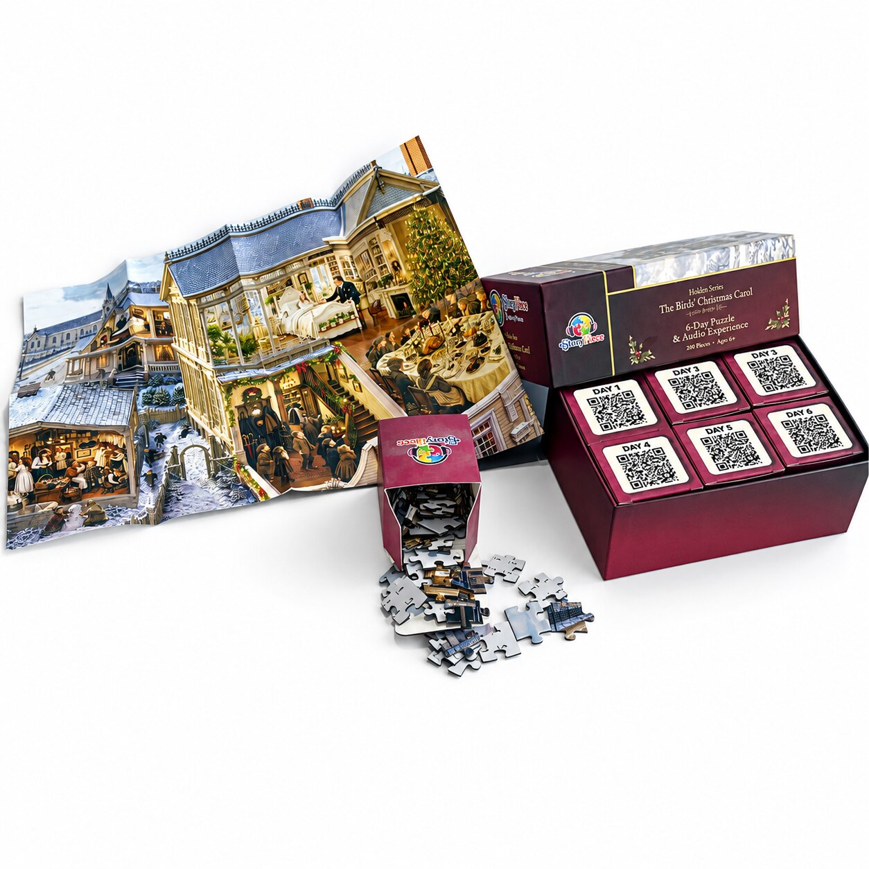 Inside The Birds’ Christmas Carol StoryPiece box: the fold-out artwork poster, six numbered daily boxes, and puzzle pieces